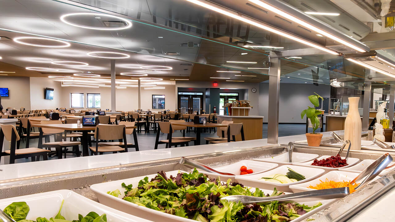 A view of the newly renovated Sibert Dinning Hall; peering over delicious greens in the salad bar.